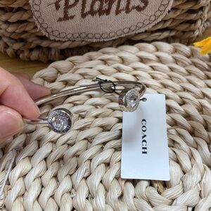 COACH Silver-Tone Crystal Open Cuff Bracelet